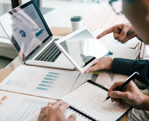 People At Work Looking At Audits