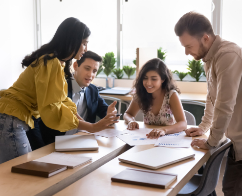 Workers Looking Over Taxes